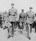 General de Gaulle. At his left is General Koenig, behind them, General Leclerc