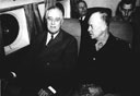 ABOARD THE PRESIDENTS PLANE. General Eisenhower with Mr. Roosevelt on the flight
from Oran to Tunis, 20 November 1943
