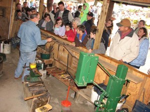 Image and Link to photos of blacksmiths demonstrating at the 2009 NC State Fair in Raleigh, NC